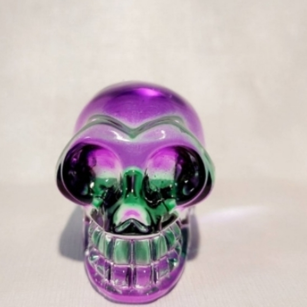 Natural Rainbow Fluorite Skull Carving.